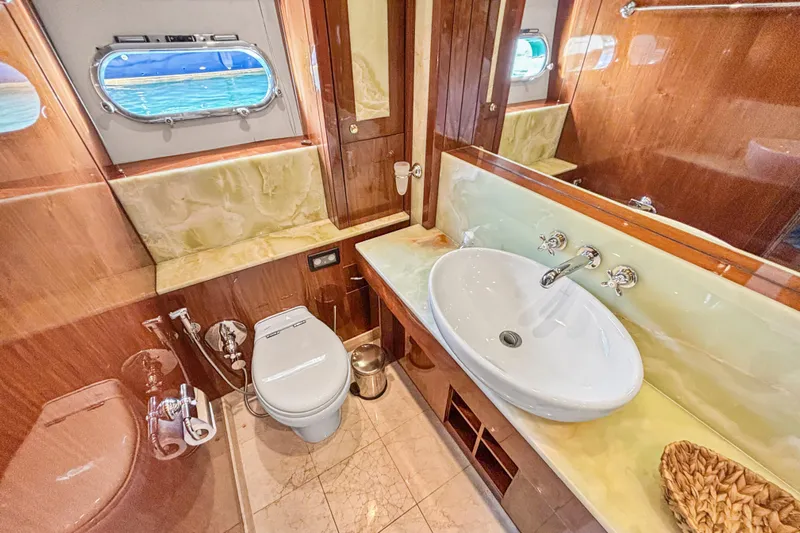  Yacht Photos Pics Luxurious bathroom on 2010 Sunseeker 30 Metre Yacht with elegant fixtures and ocean view.