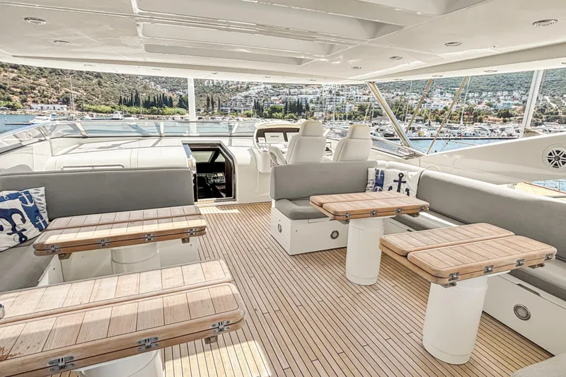  Yacht Photos Pics Luxurious Sunseeker 30 Metre Yacht 2010 with spacious deck and scenic marina view.