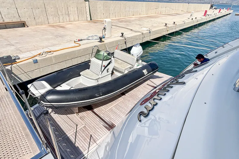  Yacht Photos Pics Sunseeker 30 Metre Yacht 2010 with tender docked at marina.