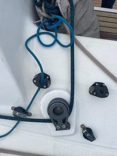  Yacht Photos Pics Deck rigging on a 2008 Beneteau First 40.7 sailboat with blue ropes and pulleys.