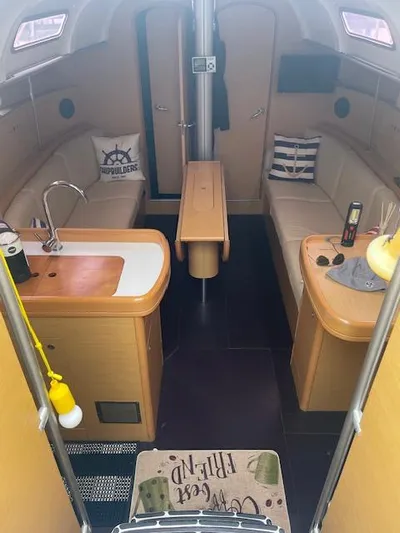  Yacht Photos Pics Interior of 2008 Beneteau First 40.7 sailboat with cozy seating and modern amenities.