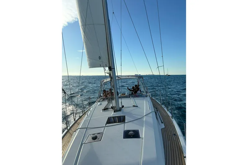 Mar III Yacht Photos Pics 2020 Beneteau Oceanis 41.1 sailing on open sea under clear blue sky.