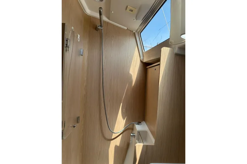 Mar III Yacht Photos Pics Beneteau Oceanis 41.1 2020 yacht interior shower with wooden finish and skylight.