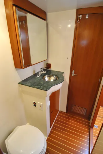 Valiant Yacht Photos Pics 2004 Transpacific Marine Eagle 40 bathroom with wood accents and compact sink.
