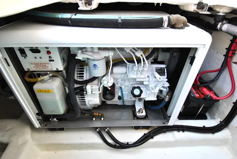 Valiant Yacht Photos Pics Engine compartment of 2004 Transpacific Marine Eagle 40, showcasing mechanical components and wiring.