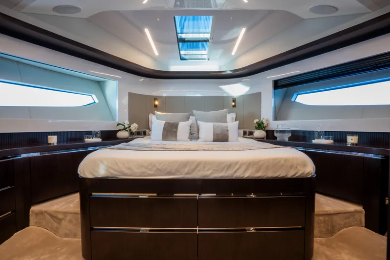 Masie Yacht Photos Pics Luxurious interior of 2023 Pearl 62 yacht with elegant bedroom design.