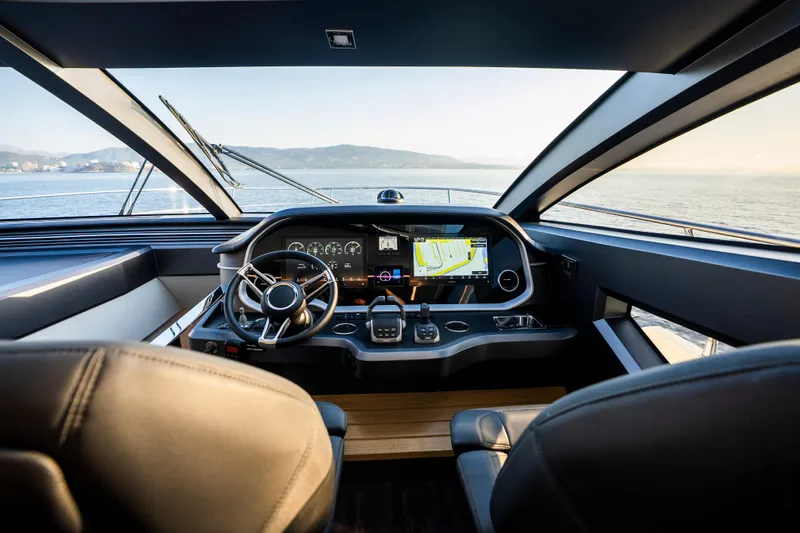 Masie Yacht Photos Pics Luxurious 2023 Pearl 62 yacht cockpit with modern navigation system and panoramic sea view.