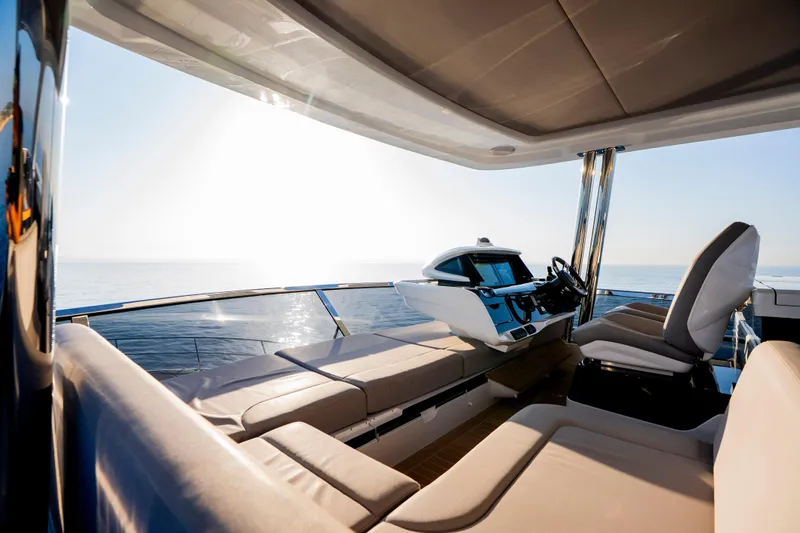 Masie Yacht Photos Pics Luxurious 2023 Pearl 62 yacht interior with modern helm and ocean view.