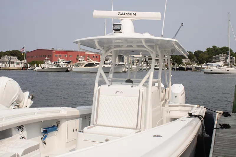  Yacht Photos Pics 2025 Yellowfin 32 Offshore boat docked at marina with Garmin equipment.