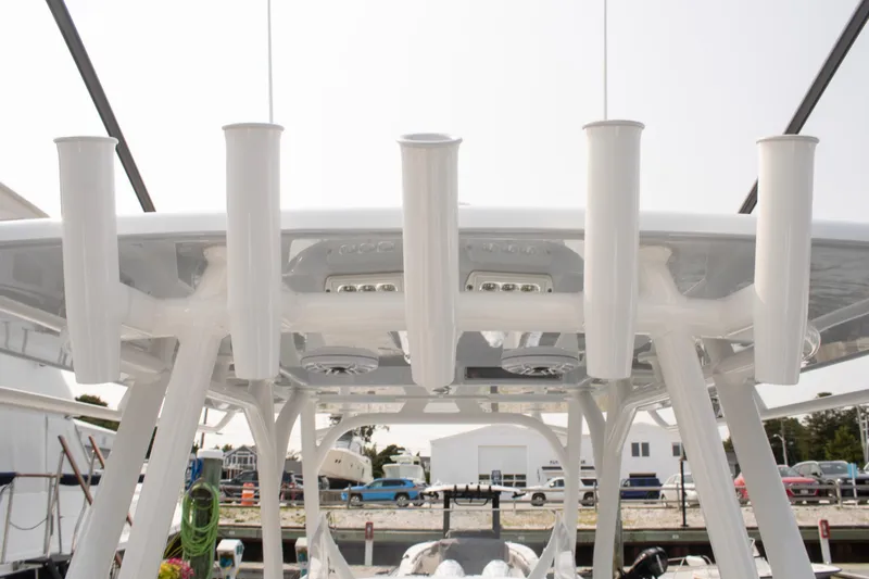  Yacht Photos Pics 2025 Yellowfin 32 Offshore boat with rod holders and overhead lighting.