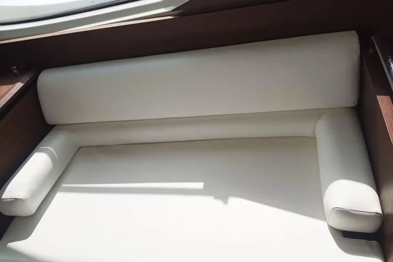  Yacht Photos Pics Luxurious white leather seating inside a 2008 Azimut 43S yacht cabin.