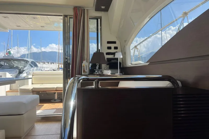  Yacht Photos Pics Interior of 2008 Azimut 43S yacht with modern furnishings and marina view.