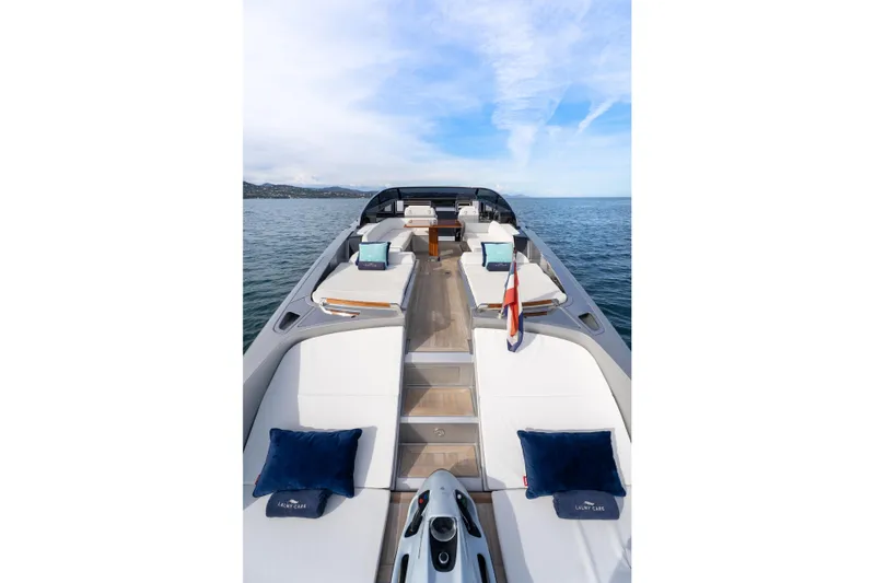  Yacht Photos Pics Luxurious 2019 Riva Dolceriva 48 yacht with elegant deck and seating on open water.