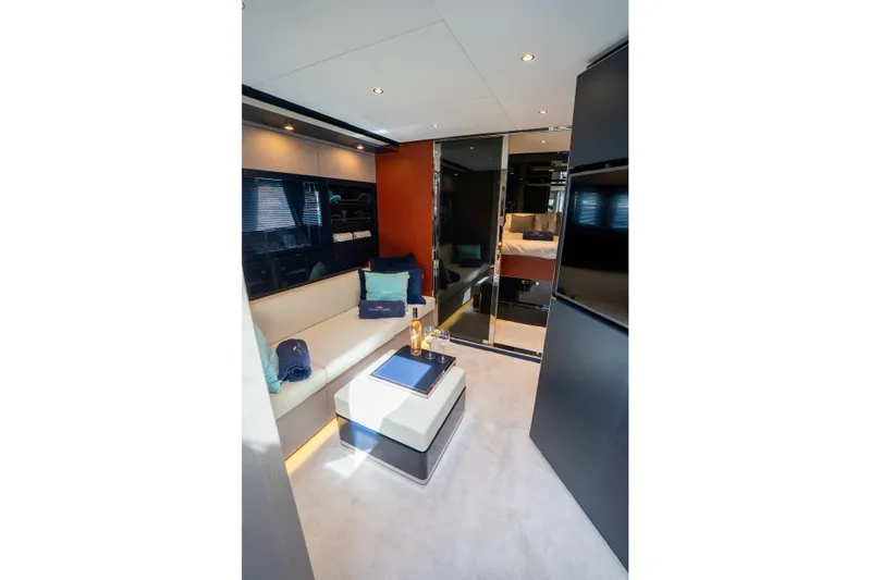  Yacht Photos Pics Luxurious interior of 2019 Riva Dolceriva 48 yacht with modern seating and decor.