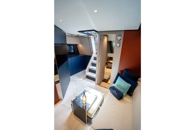  Yacht Photos Pics Luxurious interior of 2019 Riva Dolceriva 48 yacht with modern design and cozy seating.