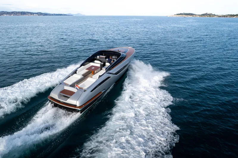  Yacht Photos Pics Riva Dolceriva 48 yacht cruising on open sea, 2019 model.