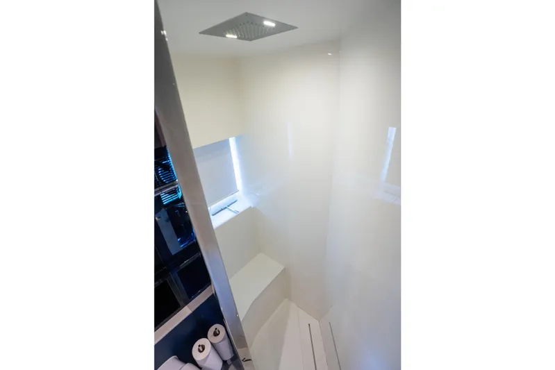  Yacht Photos Pics Luxurious bathroom interior of 2019 Riva Dolceriva 48 yacht, featuring sleek modern design.