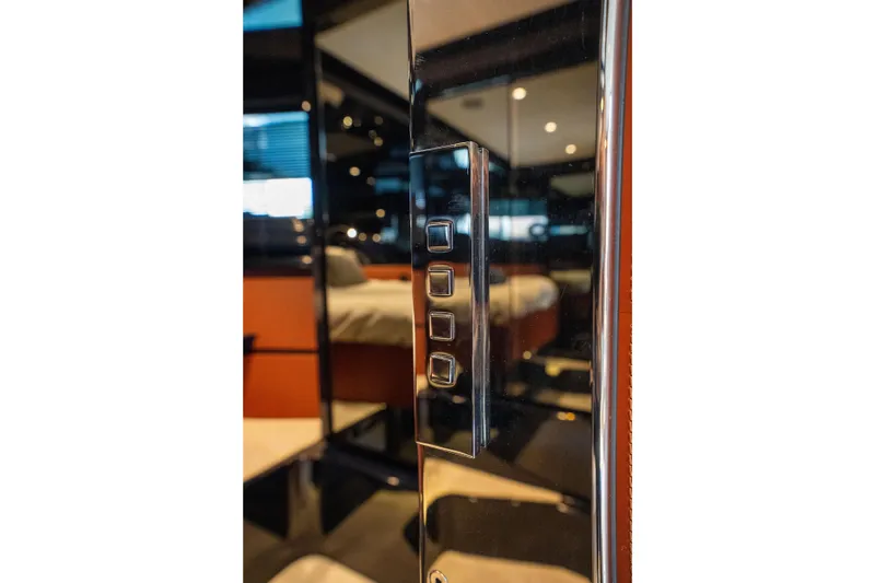  Yacht Photos Pics Interior of 2019 Riva Dolceriva 48 yacht, featuring sleek control panel and luxurious design.