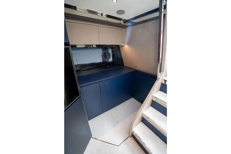  Yacht Photos Pics Interior of 2019 Riva Dolceriva 48 yacht, featuring sleek cabinetry and modern design.