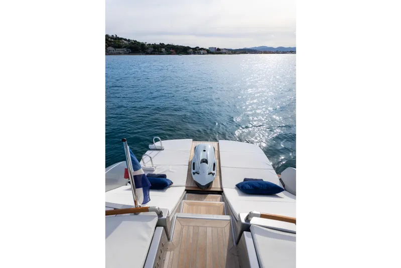 Yacht Photos Pics Riva Dolceriva 48 yacht deck with sea view, 2019 model, featuring luxurious seating.