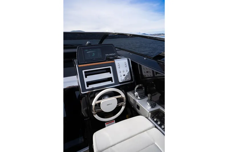  Yacht Photos Pics Helm of 2019 Riva Dolceriva 48 yacht with modern controls and steering wheel.