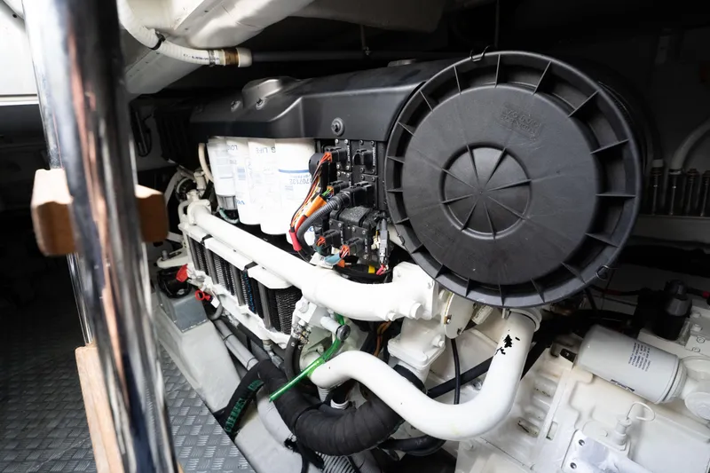  Yacht Photos Pics Engine compartment of 2019 Riva Dolceriva 48 yacht, showcasing detailed mechanical components.