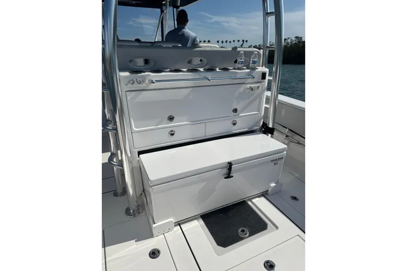  Yacht Photos Pics 2025 Contender 39 ST boat interior with storage compartments and seating.