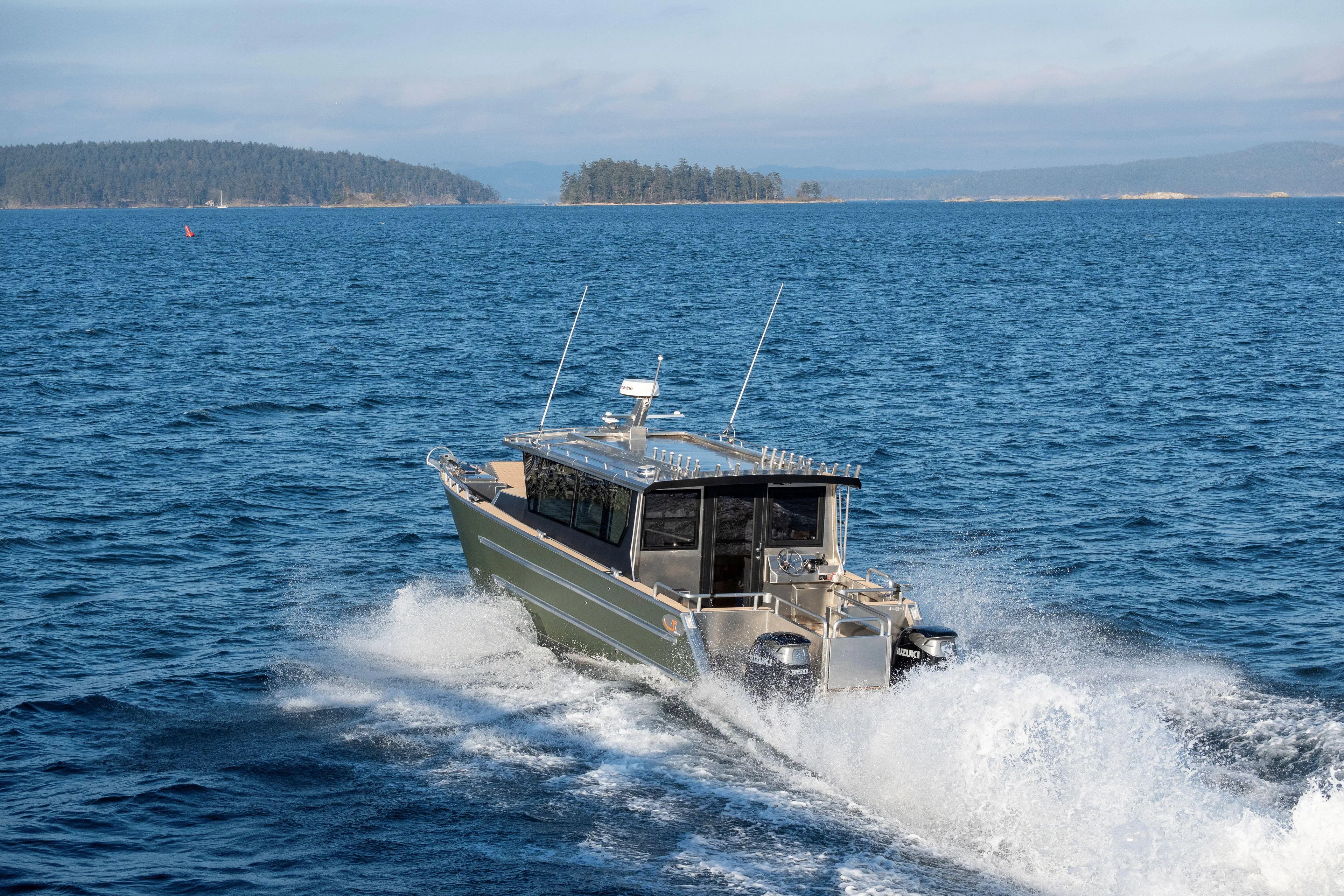  Yacht Photos Pics 2025 JR Marine 33 Savage boat cruising on open water.