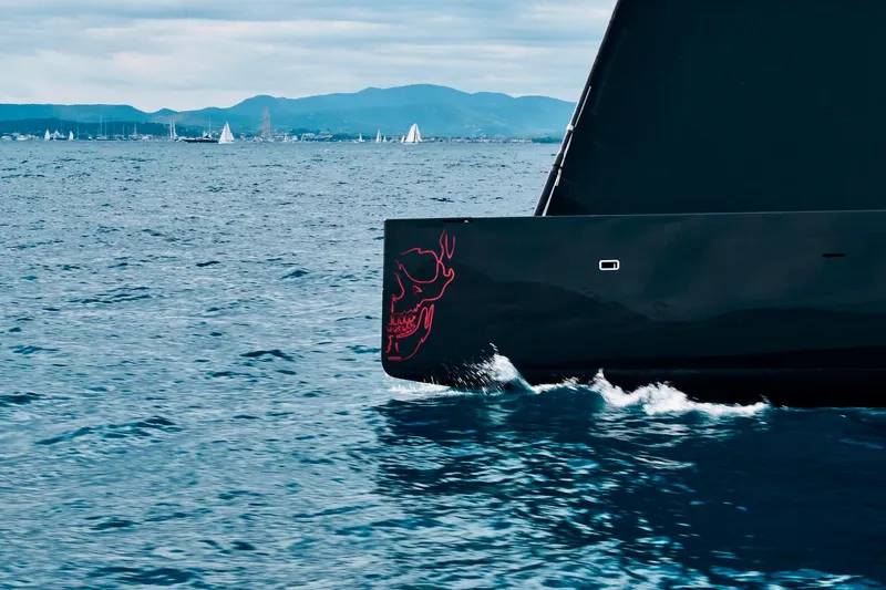 Black Sails Yacht Photos Pics Sleek black Wally 130 yacht sailing on open sea, 2009 model.