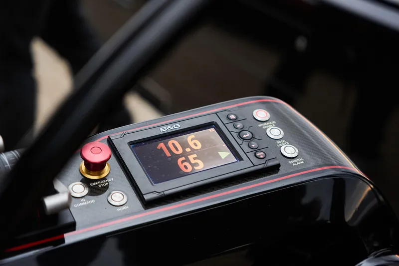 Black Sails Yacht Photos Pics Control panel of a 2009 Wally 130 yacht with digital display and emergency stop button.