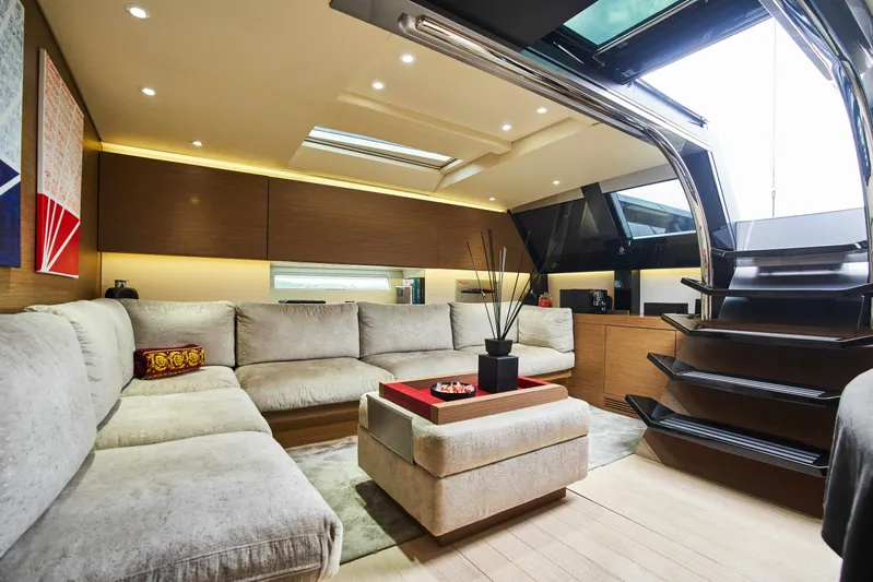 Black Sails Yacht Photos Pics Luxurious interior of 2009 Wally 130 yacht with modern design and plush seating.