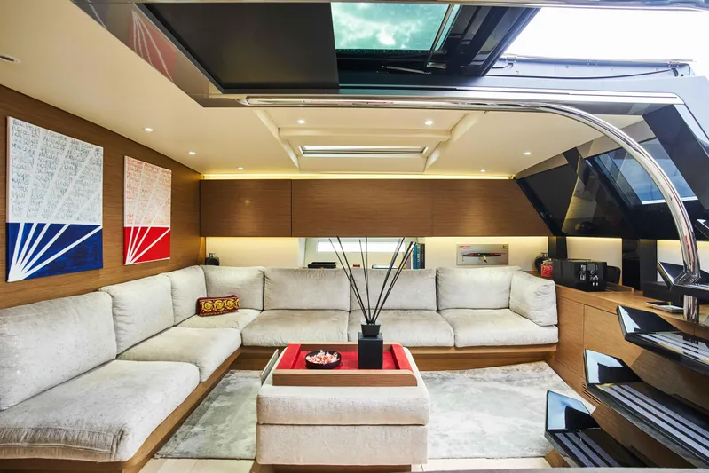 Black Sails Yacht Photos Pics Luxurious interior of 2009 Wally 130 yacht with modern decor and plush seating.