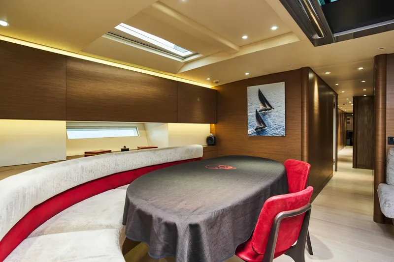 Black Sails Yacht Photos Pics Luxurious interior of 2009 Wally 130 yacht with elegant dining area and modern design.