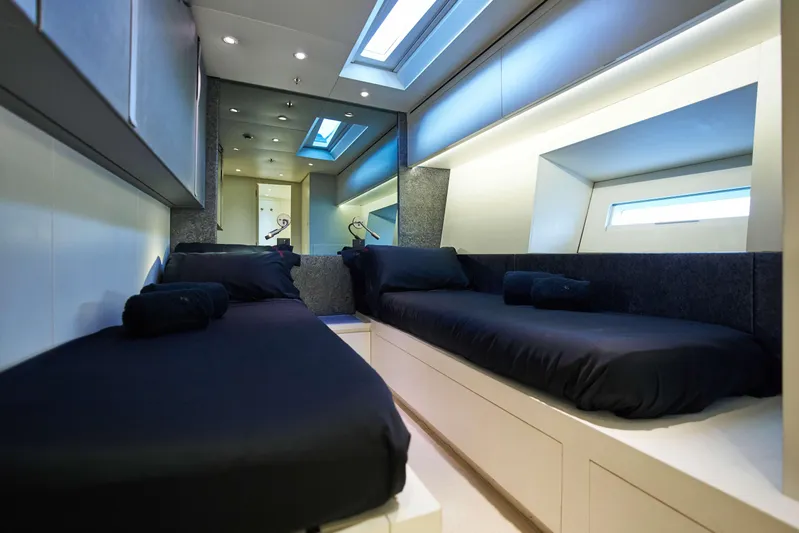 Black Sails Yacht Photos Pics Luxurious interior of 2009 Wally 130 yacht with twin beds and modern design.