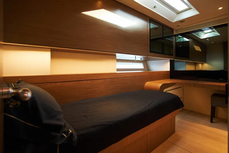 Black Sails Yacht Photos Pics Luxurious interior of 2009 Wally 130 yacht with sleek wood finishes and modern design.