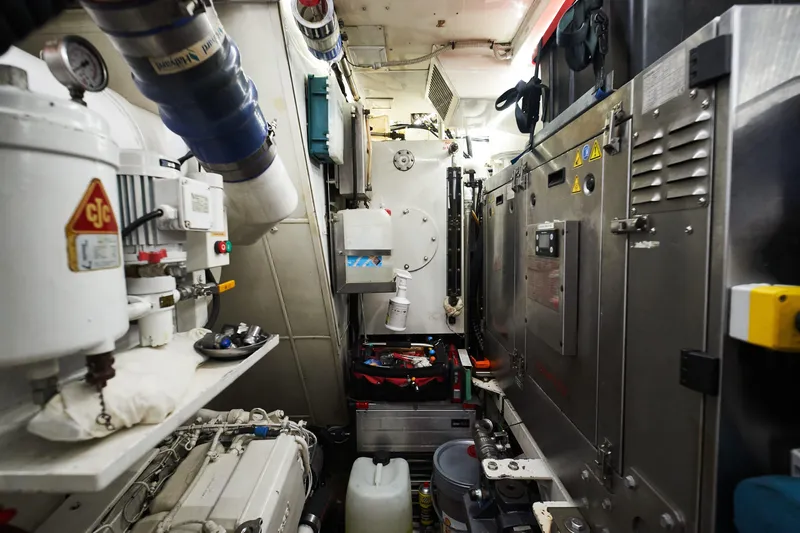 Black Sails Yacht Photos Pics Engine room of a 2009 Wally 130 yacht, featuring complex machinery and equipment.