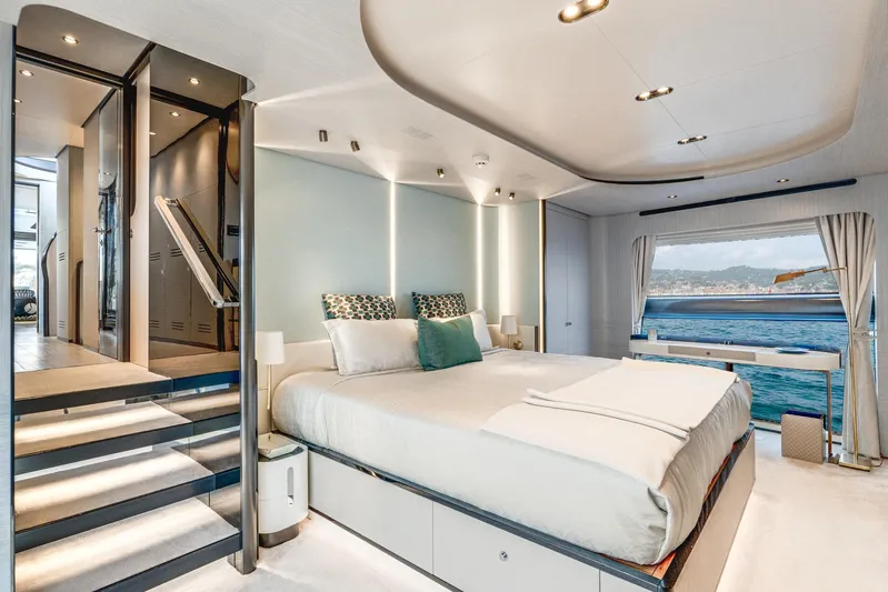  Yacht Photos Pics Luxurious bedroom interior of 2019 Azimut 27 Metri yacht with ocean view.