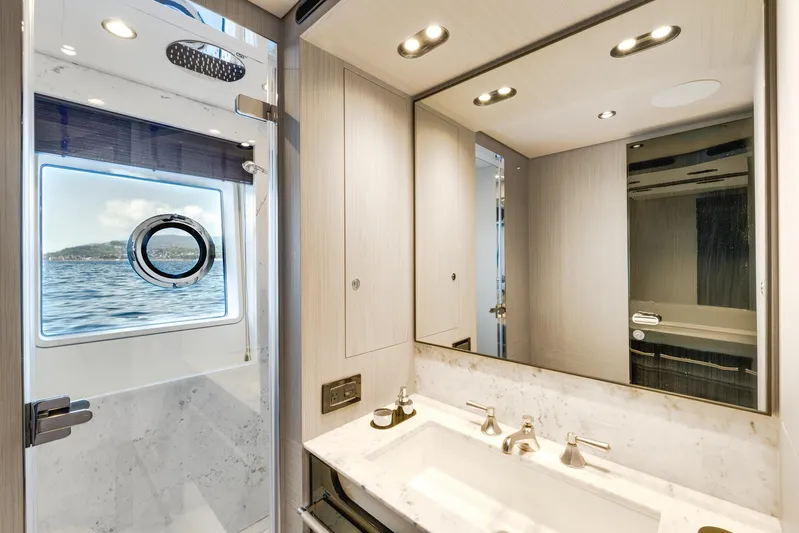 Yacht Photos Pics Luxurious bathroom on 2019 Azimut 27 Metri yacht with ocean view.