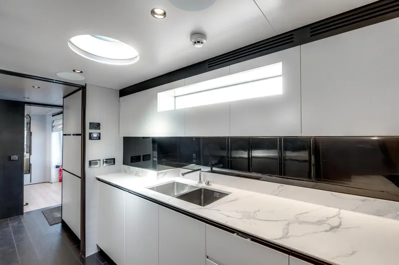  Yacht Photos Pics Luxurious kitchen interior of 2019 Azimut 27 Metri yacht with modern design.
