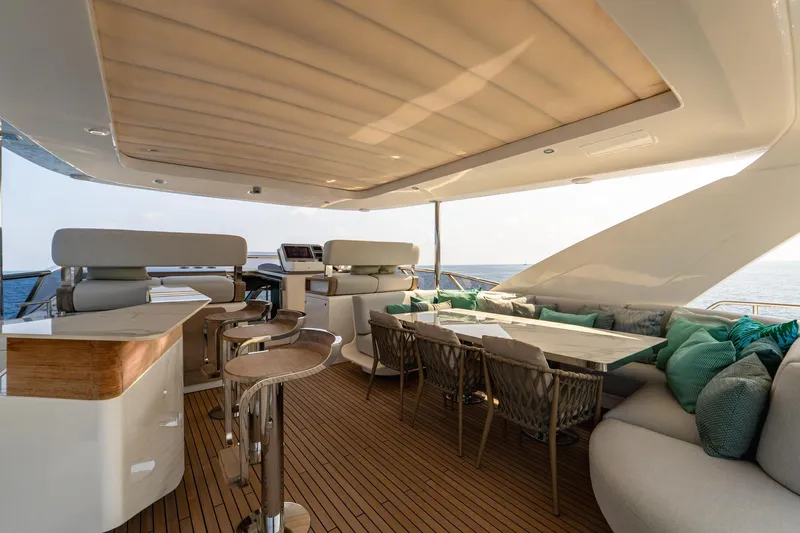  Yacht Photos Pics Luxurious 2019 Azimut 27 Metri yacht deck with elegant seating and ocean view.