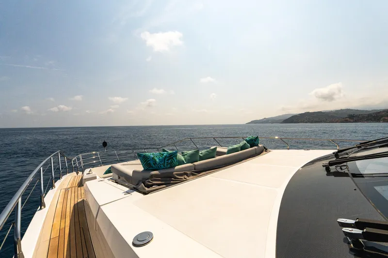  Yacht Photos Pics Luxurious 2019 Azimut 27 Metri yacht deck with ocean view and plush seating.