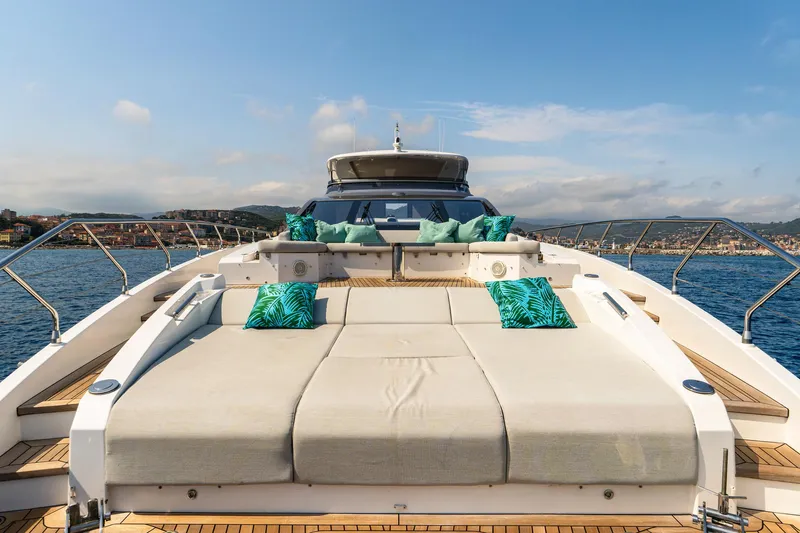  Yacht Photos Pics Luxurious 2019 Azimut 27 Metri yacht with spacious sun deck and vibrant cushions.