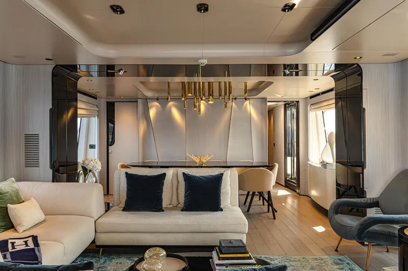  Yacht Photos Pics Luxurious interior of 2019 Azimut 27 Metri yacht with elegant seating and modern decor.