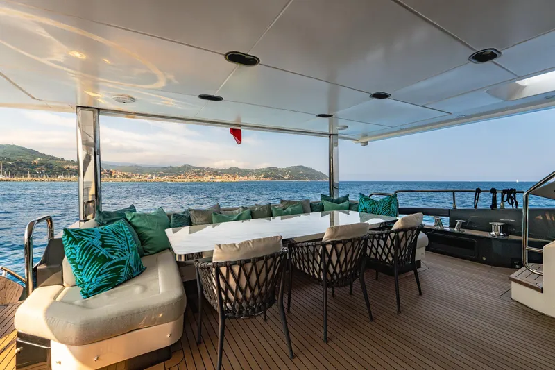  Yacht Photos Pics Luxurious 2019 Azimut 27 Metri yacht deck with elegant seating and ocean view.
