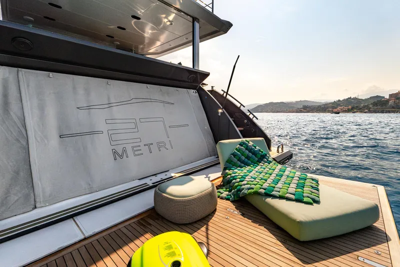  Yacht Photos Pics Luxurious 2019 Azimut 27 Metri yacht deck with sunbed and ocean view.