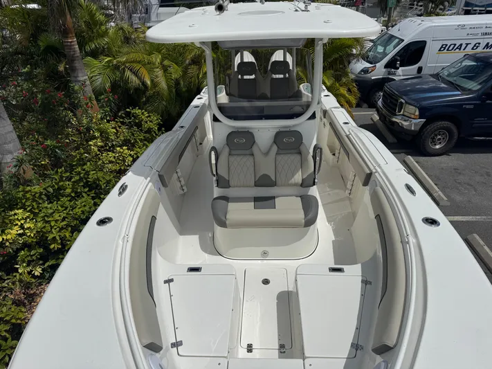  Yacht Photos Pics 2025 Key West 260 boat with spacious seating and sleek design.