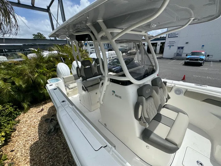  Yacht Photos Pics 2025 Key West 260 boat with sleek design and comfortable seating.