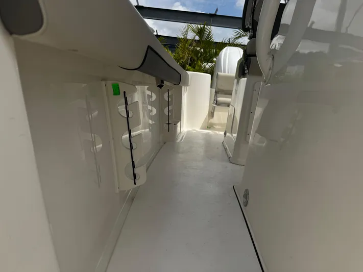  Yacht Photos Pics 2025 Key West 260 boat interior, featuring sleek white design and modern seating arrangement.