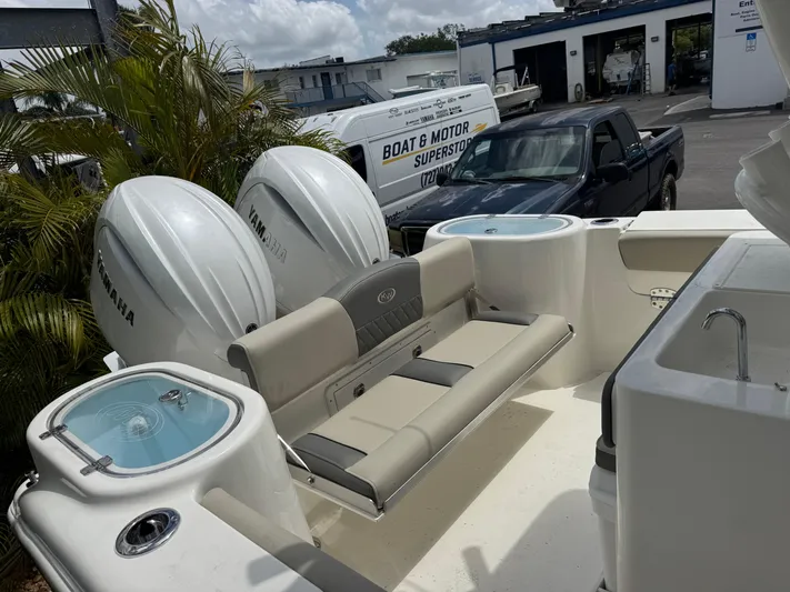  Yacht Photos Pics 2025 Key West 260 boat interior with Yamaha engines, seating, and live wells.