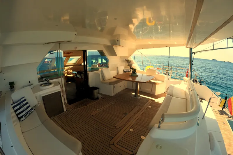 Audaz Yacht Photos Pics Luxurious 2007 Privilege 615 yacht interior with elegant seating and ocean view.